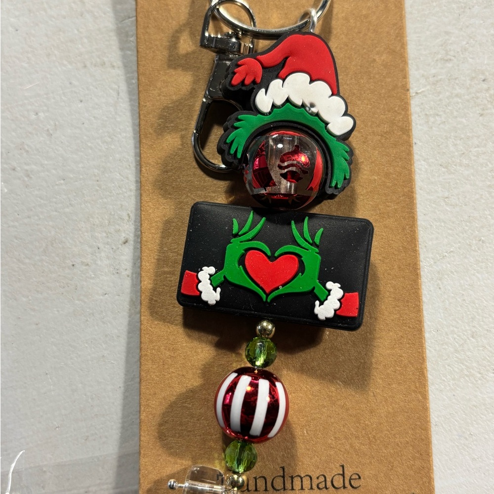 Festive Keychain with Santa Hat and Heart Design